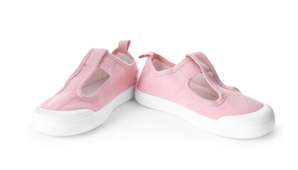 Pair of pink kid's shoes isolated on white