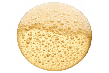 Golden liquid beer foam and bubbles texture forming round shape, effervescent alcoholic beverage on transparent background