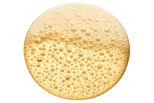 Golden liquid beer foam and bubbles texture forming round shape, effervescent alcoholic beverage on transparent background