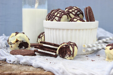 chocolate cookies and milk on the table. Sweet pastries