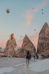 man and woman on a mountain