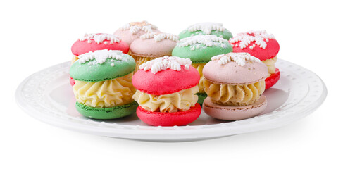Festively decorated macarons isolated on white. Christmas treat