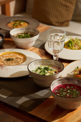 A Colorful Assortment of Gourmet Soups Presented Beautifully in Elegant and Stylish Bowls