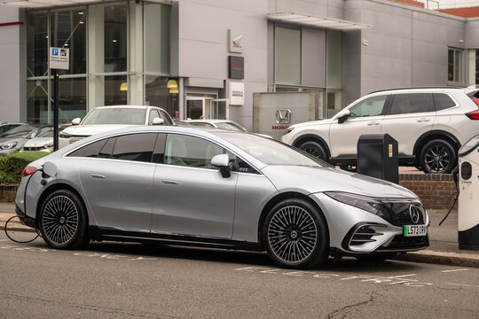 LONDON-  Mercedes EQS 450+  electric car charging on an urban street in London