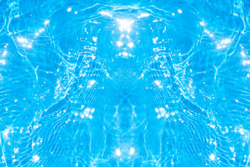 Blue water with ripples on the surface. Defocus blurred transparent blue colored clear calm water surface texture with splashes and bubbles. Water waves with shining pattern texture background.