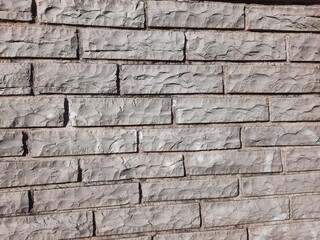 Abstract background of stone wall texture in the park