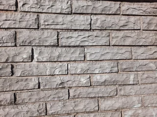 Fototapete Edelstein Abstract background of stone wall texture in the park  © Miriana