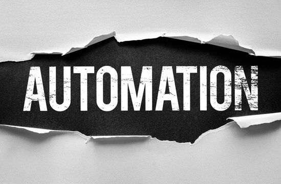 Word AUTOMATION revealed through torn paper in bold, distressed white font. Concept for technology, AI, robotics, efficiency, digital transformation, industry 4.0, and smart systems