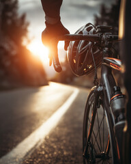 Cyclist with helmet holding bike by road