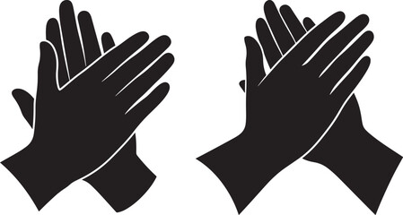Obraz premium Two black silhouettes of hands clapping together