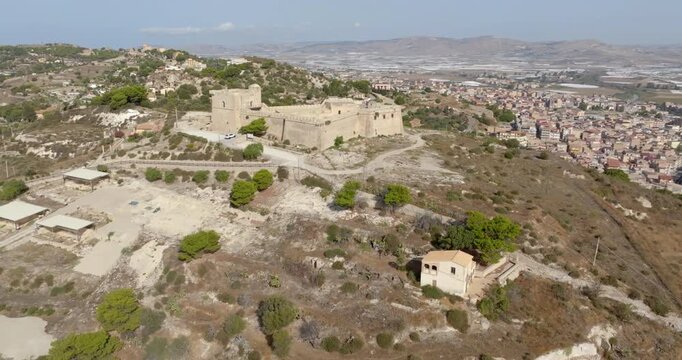 Aerial view of Castel Sant'Angelo, also known as Sant'Angelo Fort. It is an ancient castle located in Licata, in the province of Agrigento, Sicily, Italy. In the background is the city.