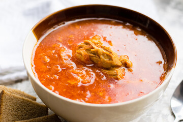 Delicious and aromatic red soup with meat, Ukrainian borscht. Traditional Ukrainian dish, cuisine