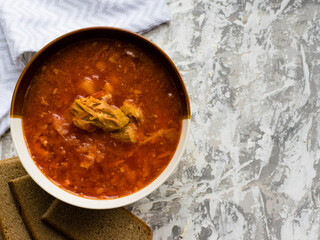 Delicious and aromatic red soup with meat, Ukrainian borscht. Traditional Ukrainian dish, cuisine