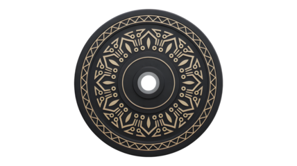 A round metal plate with intricate patterns rotates on a black background.