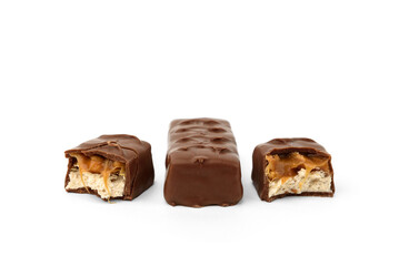 Chocolate bar with nougat, caramel and peanut isolated on white background.