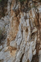 Layered rock formations on Mount Babadag in Turkey. Stone background, natural stone texture