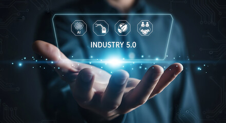Person holding futuristic icons representing industry 5.0 with ai, automation, environment, and collaboration.