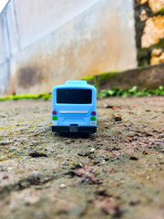 Blue toy bus for children, rear and side view