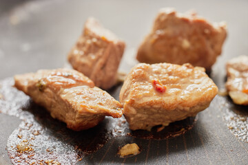 Close-up of stewed beef meat in a frying pan