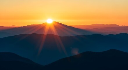 A breathtaking golden sunrise illuminates the rugged peaks of a majestic mountain range, casting long, vibrant rays across the serene morning sky and silhouetting the layered landscape at dawn
