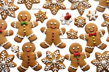 Christmas gingerbread man and woman cookies decorated with icing