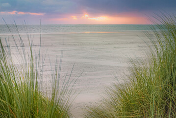 Dutch coastline landscape at sunset, Netherlands