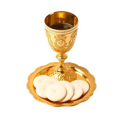 A golden chalice with dark liquid and white wafers on a plate