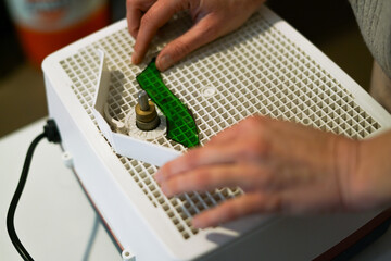 Making stained glass during artistic workshop. 