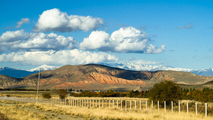 mountain peaks in the clouds. a beautiful mountain gorge. autumn in the mountains