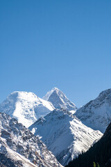 snow-capped mountain peaks. highlands, cliffs