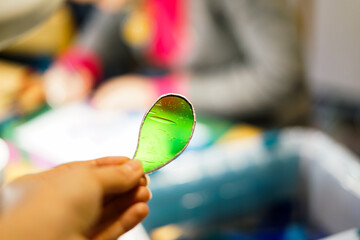 Making stained glass during artistic workshop. 