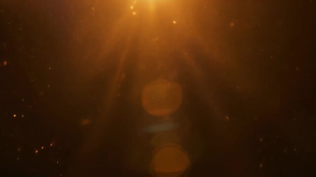 Warm light scattering through subtle dust motion creating a cozy and cinematic seamless 16-9 background with soft ambient glow and gentle atmospheric visual aesthetic