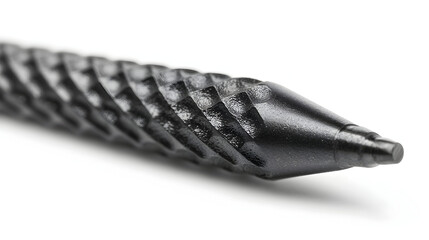 Textured black metal drill bit close up