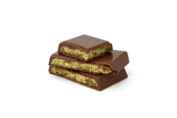 Pile of Dubai chocolate bar with with pistachio isolated on white background.