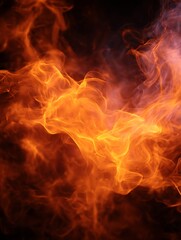 Fototapeta premium Dynamic fire flames burning brightly against a solid black background