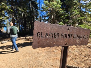 Glacier Point Road Trail Sign With Hiker