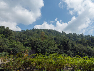 Obraz premium beautiful landscape photography of a town and clouds, sky, hills bridge, river and a path around a park clean unique and latest