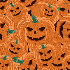 Seamless vector pattern with spooky orange Halloween pumpkins