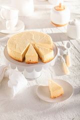 Classic New york cheesecake served on white stone table.