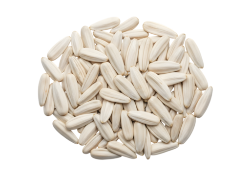 Pile of white sunflower seeds with visible striations and a dark background isolated on a transparent background
