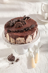 Sweet cheesecake served on white wooden table.