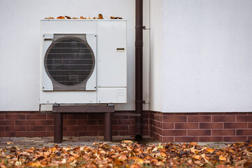 Heat Pump in Autumn Outdoor. Heat Pump Efficiency and Performance in Fall. 