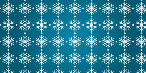 Seamless white snowflake pattern on a blue gradient background for winter holiday wrapping paper.