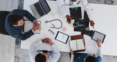 Above, doctors and people in hospital, meeting and healthcare with planning for schedule. Documents, tech and group win clinic, medical service and wellness with discussion, feedback and support - Powered by Adobe