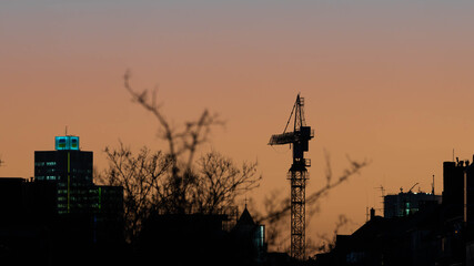 Crane in the Sunset of Duesseldorf Germany in November 2025 - City Developement. High quality photo