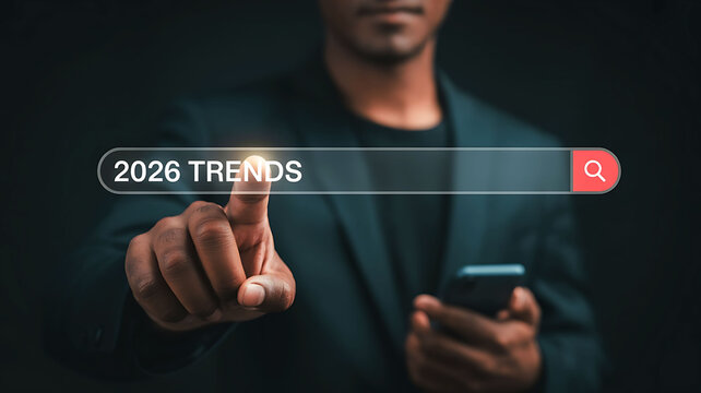 Exploring 2026 Trends An African American Businessman Using Digital Search Bar on Futuristic Interface - Powered by Adobe