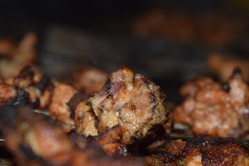 Culinary Delights: Close-up of seasoned cooked, showing rich textures and flavors, capturing the essence of culinary artistry and gastronomic indulgence. 