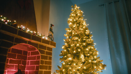 Christmas tree next to the fireplace in a cozy mountain home