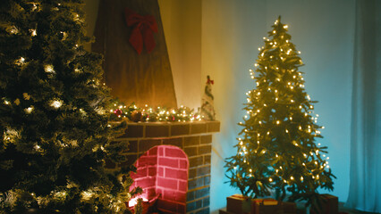Christmas Trees Near the Fireplace in the Room Illuminated Cozy Atmosphere