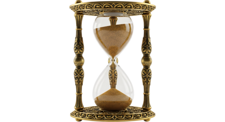 Ornate hourglass with golden frame and sand flowing through the glass on a black background